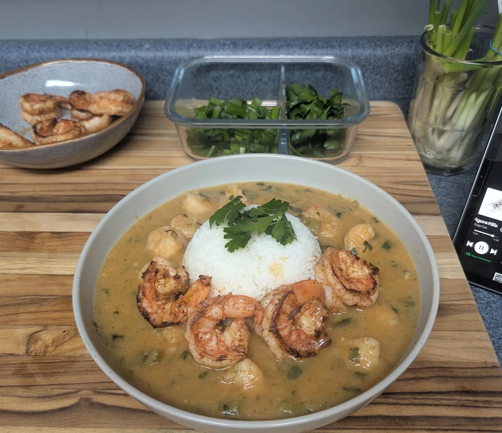 Shrimp étouffée over a mound of white rice